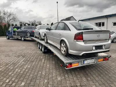 Tomi-Car Pomoc Drogowa 24H Laweta Konin Autostrada A2 Holowanie Transport Przewóz maszyn Czynne 24H